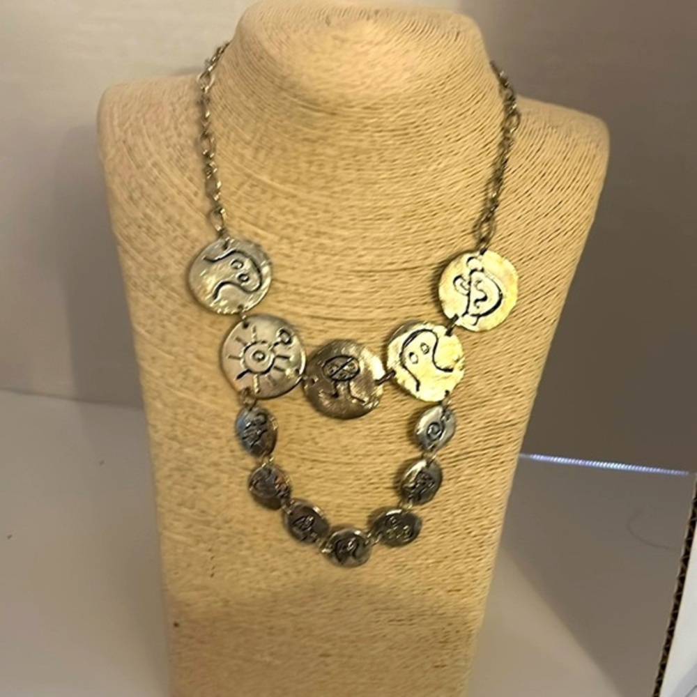 Bohemian silver tone textured coin charmed necklace